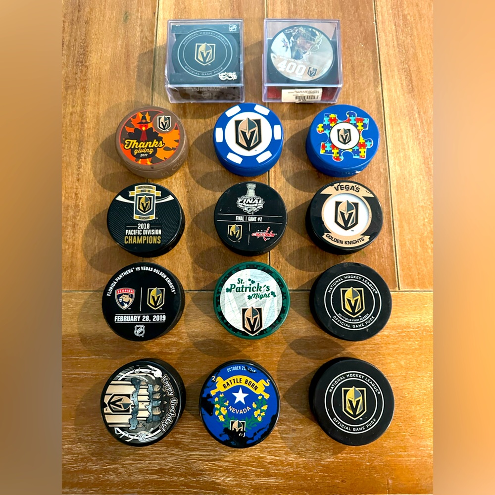 14 VGK Pucks (includes 2 game used warm up pucks)